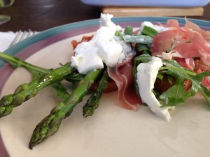 A great salad with asparagus, prosciutto, and cheese.