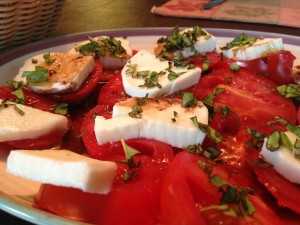 Tomato, fresh mozzarella, and basil salad.